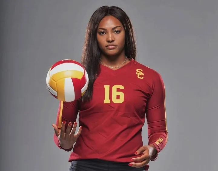 Khalia Lanier holding a volleyball